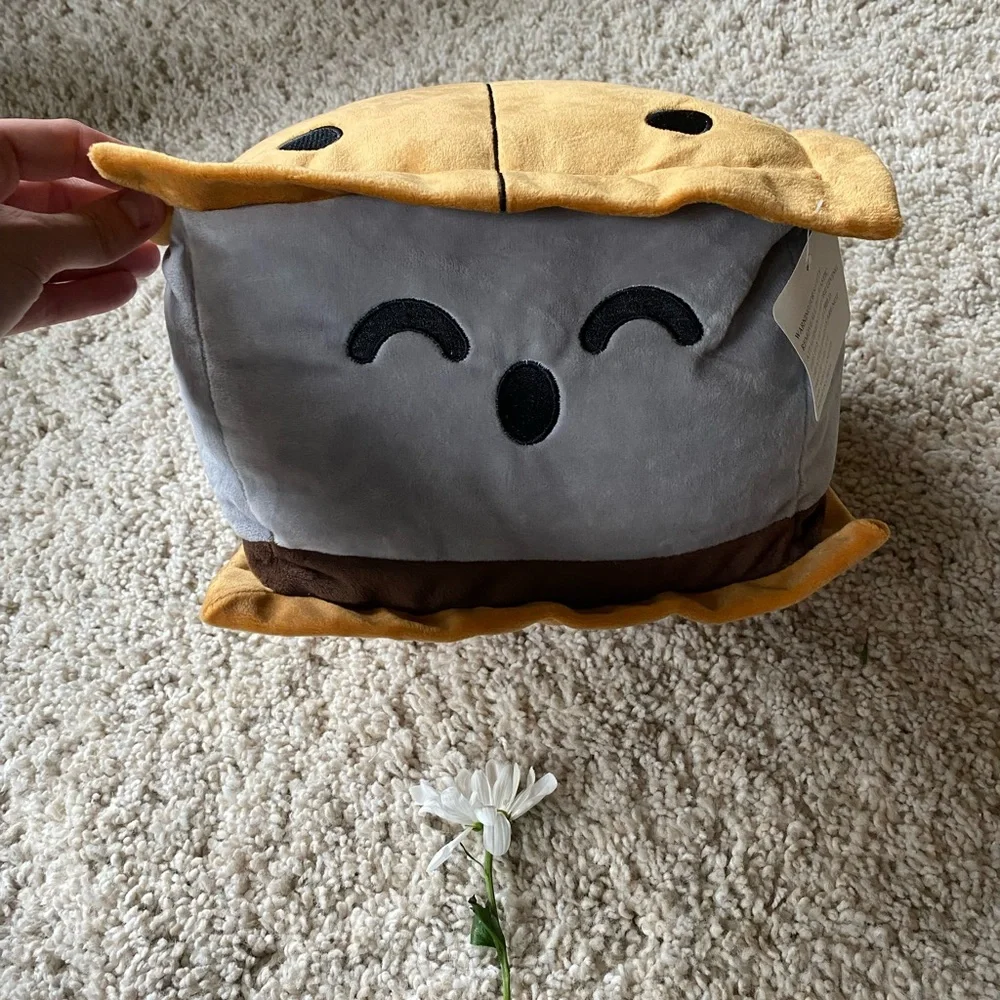 The most adorable plush pillow and medium size. Looks like a little happ…